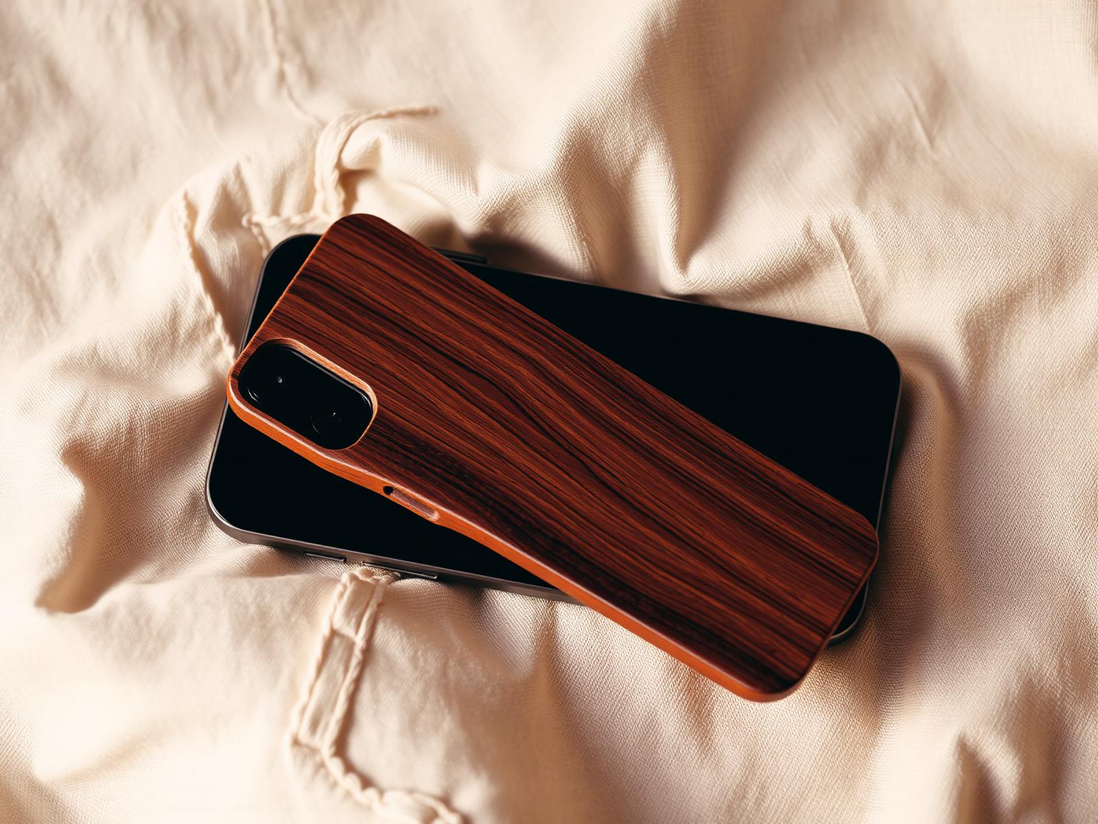 Natural walnut wood phone case on linen